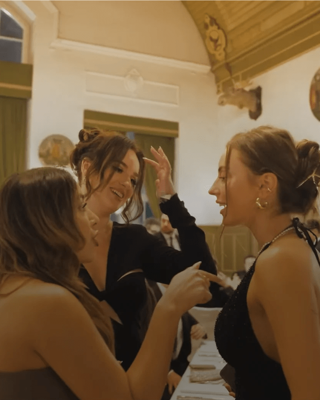 Guests laughing together at RISE Munich 2025