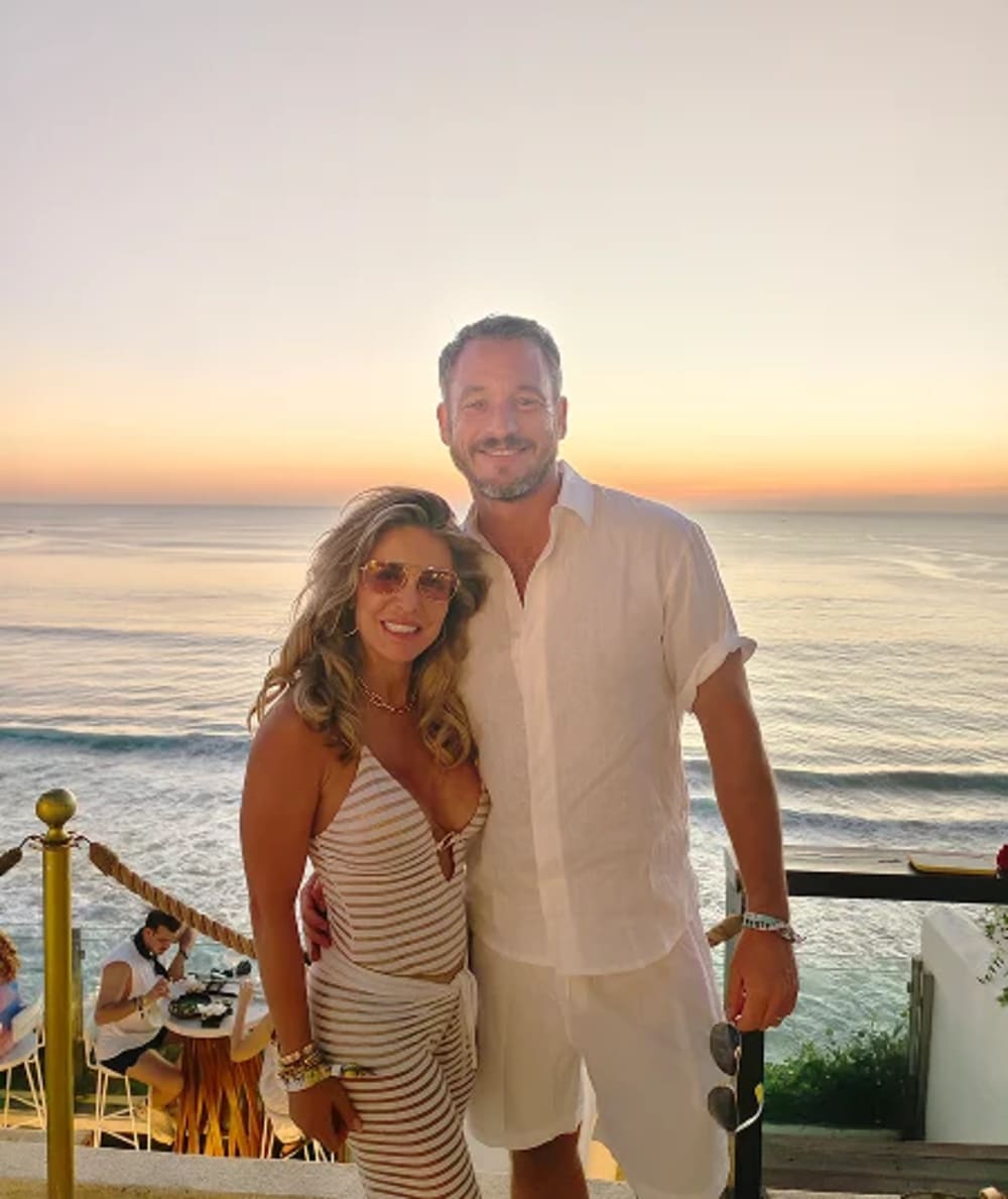A couple at a sunset celebration in Bali