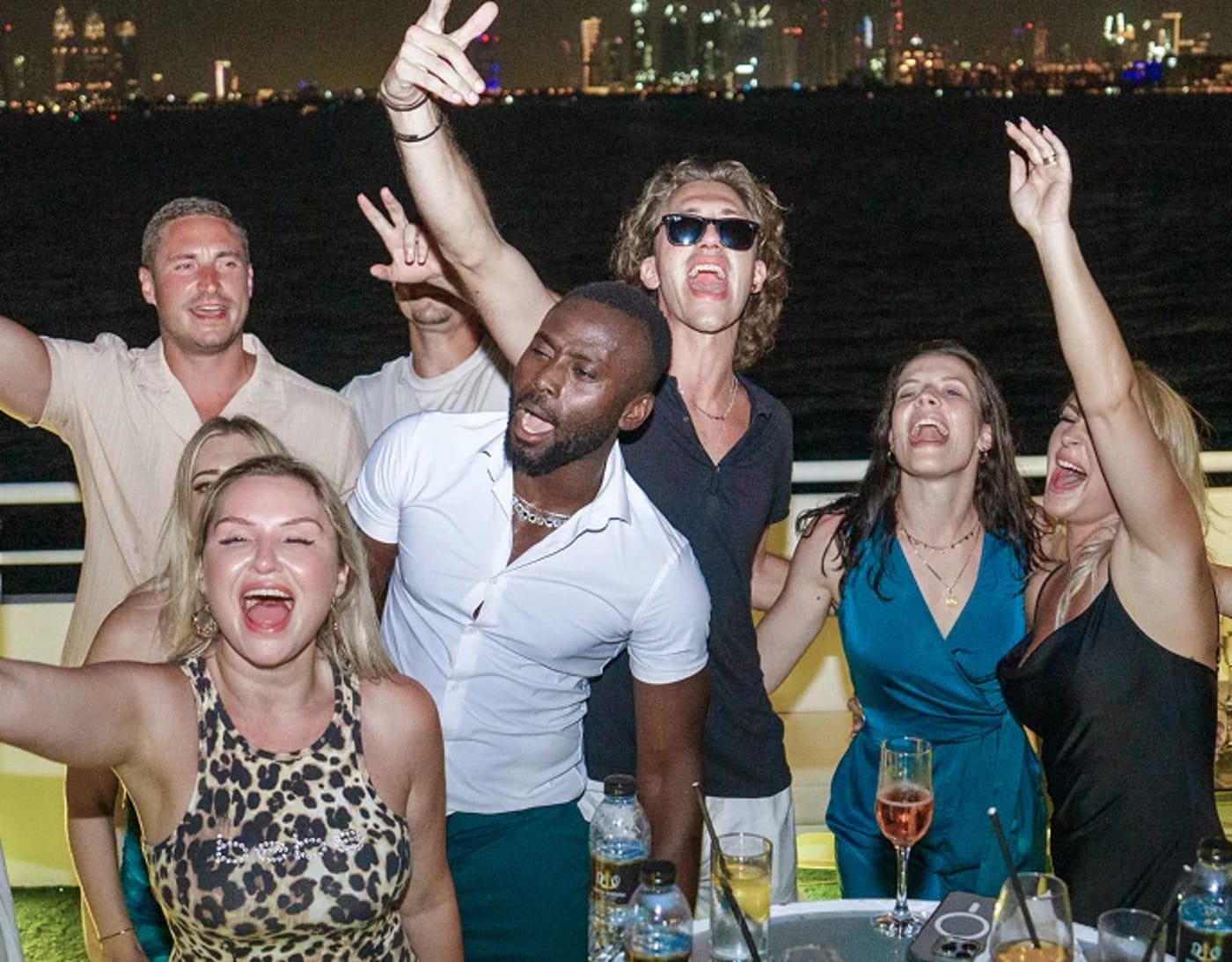 Members celebrating at the farewell yacht party